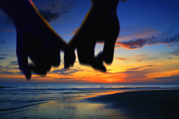 Help With Spousal Support Arrangements - lover holding hand walking on the beach